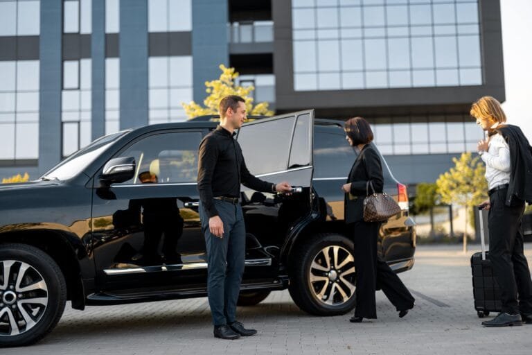 Chauffeur Service & Airport Transfer in UAE driver opening car door